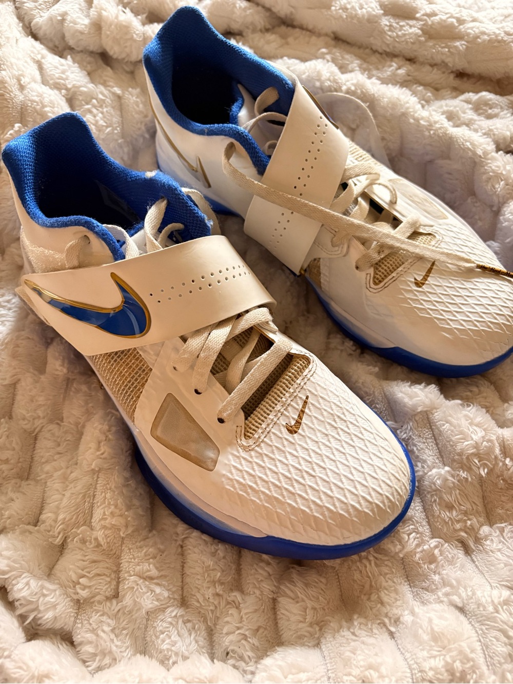 Nike White Sneakers with Blue and Gold Accents